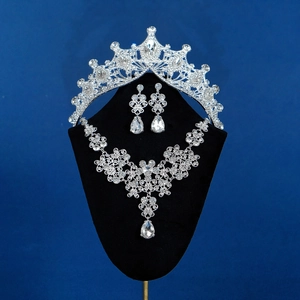 Exquisite bridal jewelry set with sparkling rhinestones on a black velvet mannequin