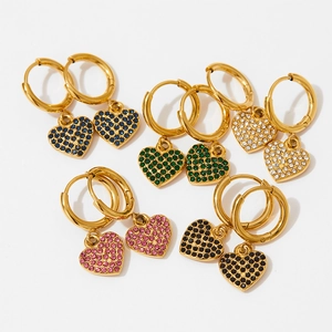 Golden hoop earrings with zircon heart pendants in five colors on a white background