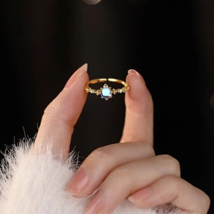 Elegant S925 sterling silver open ring with blue moonstone and gold plating details