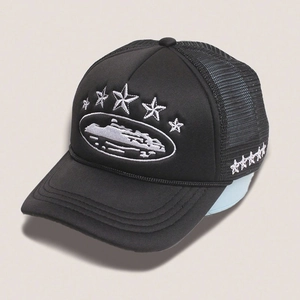 Close-up of five-star embroidery and breathable mesh on a black trucker hat