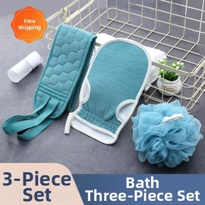 Close-up of three-piece blue bath set with back scrubber, mitt and sponge in a basket