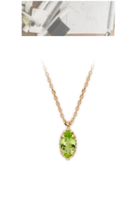 Detail of vintage French style S925 silver necklace with green olive cut gemstone