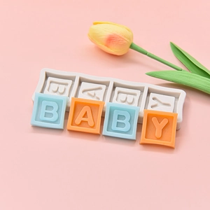 Silicone baby letter cake mold set for fondant and chocolate on pink background