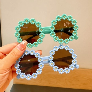 Cute daisy flower shaped sunglasses for kids in mint green and light blue colors