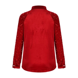 Rear view of red velvet shirt featuring sparkling sequined sleeves and elegant collar