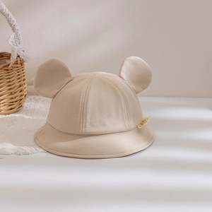 Detailed view of beige corduroy baby bucket hat featuring cute 3D bear ears on top