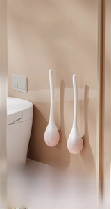 Wall-mounted silicone toilet brush with water-drop design and gradient pink holder