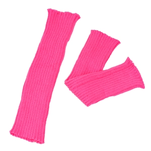 Detail of rose red knit leg warmers showing soft vintage ribbed texture and fabric