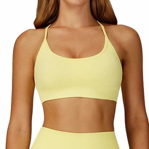 Seamless light yellow sports bra with ribbed hem and high elasticity for running and fitness