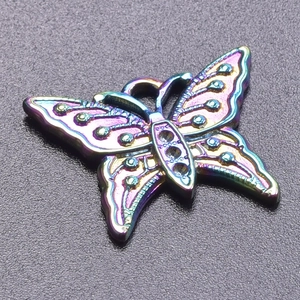 Macro view of a 18k gold plated rainbow butterfly pendant for DIY necklaces