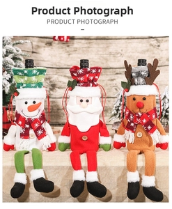 Three-piece Christmas wine bottle covers featuring plush Santa, snowman and reindeer figures