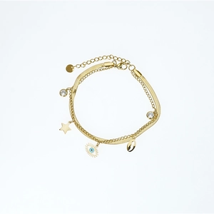 Golden double-layer Evil Eye bracelet with star and shell charms on white background