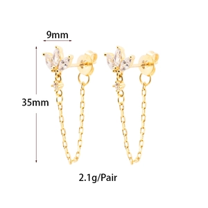 Detail view of gold tassel earrings with zircon leaves showing dimensions 9mm by 35mm
