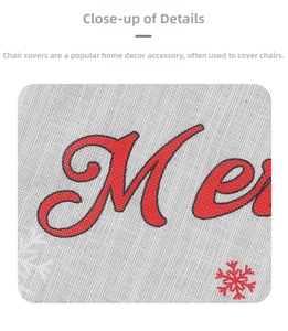 Macro detail of the Merry Christmas fabric chair cover featuring a red snowflake and linen texture