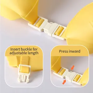 Adjustable yellow silicone baby shower cap with secure white buckle for ear protection