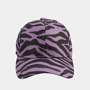 Close-up of purple and black zebra pattern on a structured six-panel cotton baseball cap