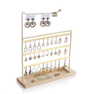 Golden iron earring stand with solid wood base for jewelry storage and display