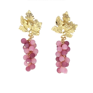 Grape drop earrings with golden leaves and frosted purple beads on a white background