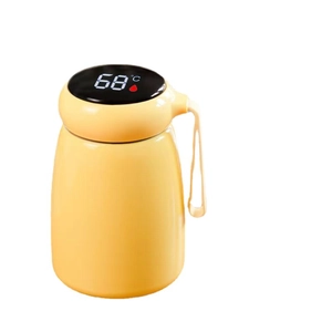 Smart mushroom vacuum flask in pale yellow with LED temperature display on a white background