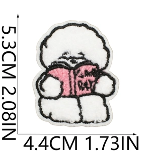 Detailed view of dog embroidery patch reading a book with precise size dimensions