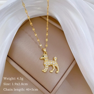 Detail of poodle pendant necklace with pavé cubic zirconia in a jewelry box