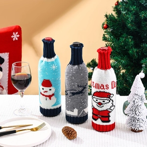 Lot de 3 couvre-bouteilles de Noël tricotés avec motifs père Noël, renne et bonhomme de neige
