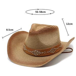 Detailed view of straw cowboy hat dimensions, leather band and bohemian metal rivets