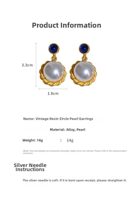 Detail view of retro earrings with blue resin and pearls, size 3.3cm x 1.8cm, weighing 14g