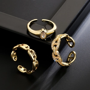 Set of 18K gold-plated rings featuring coffee bean links and sparkling zircon stones