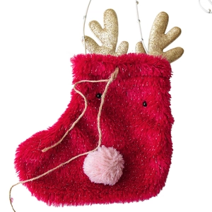 Red plush Christmas stocking gift bag with gold glitter antlers and reindeer facial details