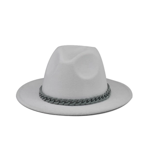 Close-up of white wool fedora hat featuring a stylish grey thick chain band accessory