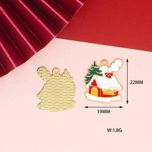 Detail of Christmas snow house pendant with red glaze and gold plating, 22mm x 19mm size