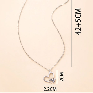 Detailed size view of silver scissors and comb heart pendant necklace, 42+5cm length