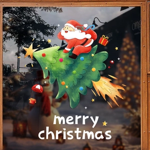 Christmas window stickers featuring Santa Claus on a rocket tree for holiday glass decoration
