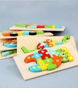 Close-up of stacked wooden dinosaur and animal number puzzles for early childhood learning