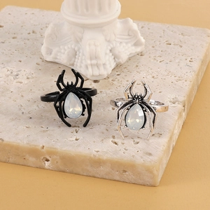 Vintage spider open ring with pear shaped white opal in black and silver metal finish