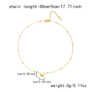 Detailed view of gold heart pendant with 40+5cm chain specs and S.STEEL hallmark