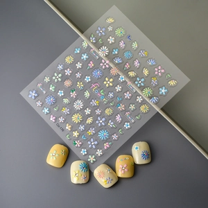Detail view of Co-176 5D floral nail stickers with embossed daisies and rhinestones