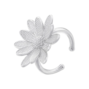 Detailed close-up of a silver daisy flower ring with textured petals and open band design