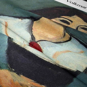 Macro detail of Bohemian tapestry showing oil painting style portrait and fine fabric texture