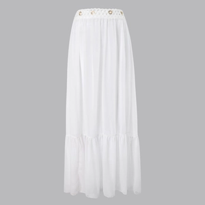 Close-up of white mesh maxi skirt with lace cutouts, eyelets, and ruffled hem details