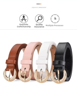 Detail of elegant women's belts with rhinestone buckles in brown, pink, white, and black