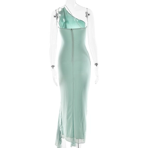 Back view of a turquoise one-shoulder dress with invisible zipper and mesh splice hem
