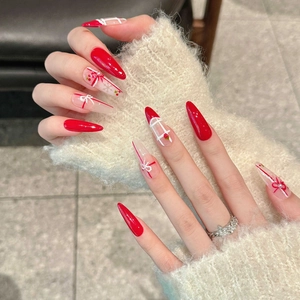 Handmade stiletto press-on nails with red cherry strawberry and white bow designs