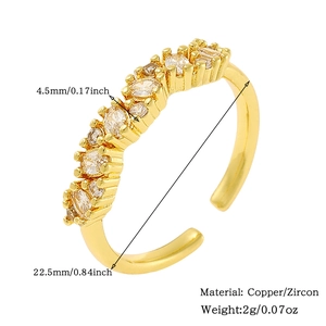 Macro view of gold plated copper ring with zircon pave and size dimension markers