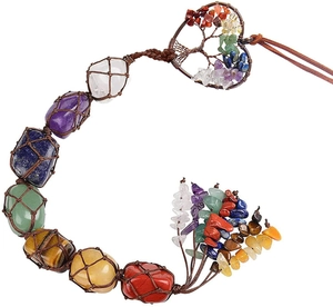 Detail of life tree chakra wall decor with natural crystal stones and woven rope