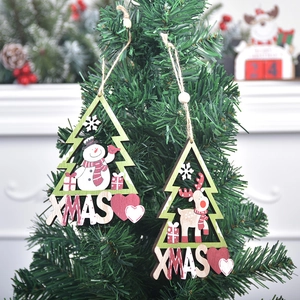 Handcrafted wooden Christmas tree ornaments with elk and snowman designs in festive colors