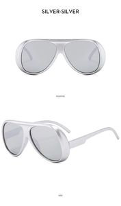 Front and side views of silver mirrored oversized cycling sunglasses with matte metal frame