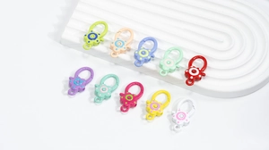 Macro shot of colorful flower spring ring clasps for DIY jewelry and keychain making
