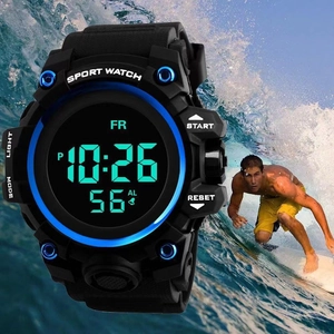 Digital sport watch detail with blue inner bezel and professional waterproof surfing background